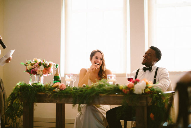 Laughing bride and groom