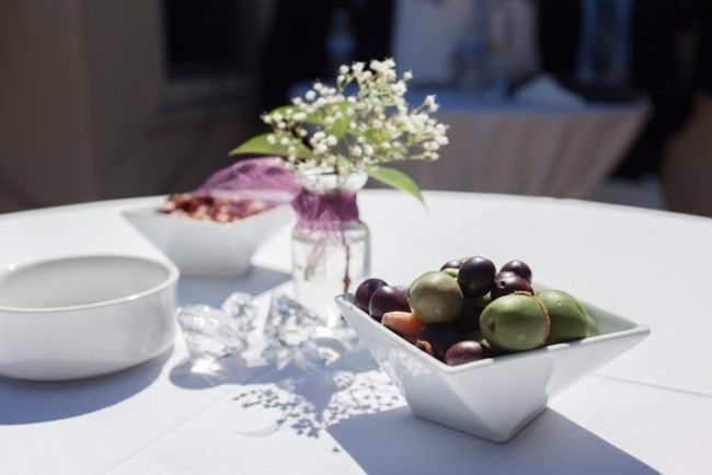 White dish of olives