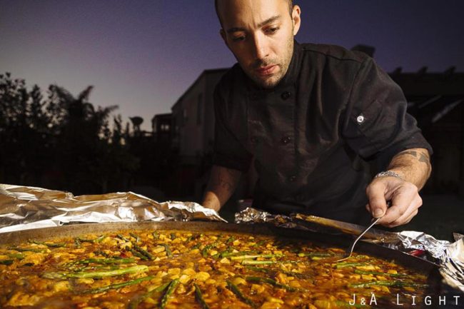 Chef Sergio Monleon cooking paella